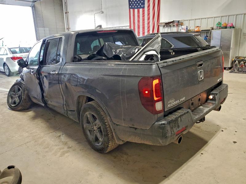 Photo 2 from auction – 2023 HONDA RIDGELINE with VIN 5FPYK3F7XPB059644