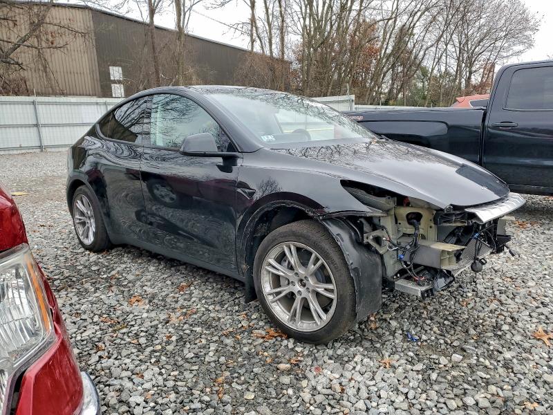 Photo 4 from auction – 2023 TESLA MODEL Y with VIN 7SAYGDEE1PF863544