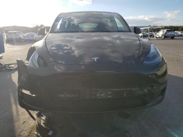 Photo 5 from auction – 2023 TESLA MODEL Y with VIN 7SAYGDEE7PA182866