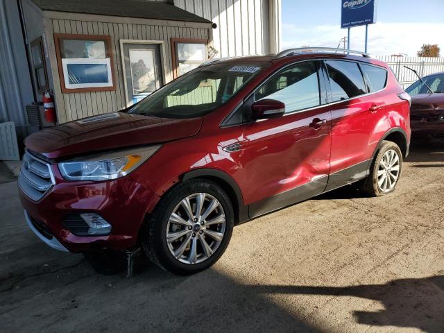 FORD ESCAPE TIT 2018 with VIN 1FMCU0J93JUA40867 - Photo from auction