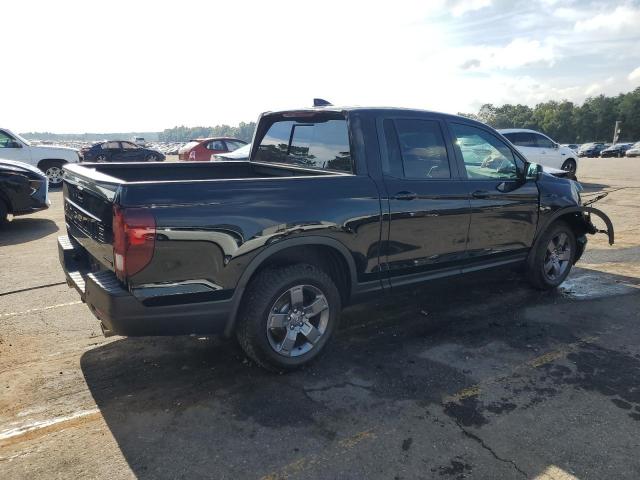 Photo 3 from auction – 2024 HONDA RIDGELINE with VIN 5FPYK3F67RB009973