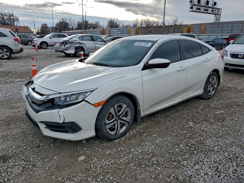 HONDA CIVIC LX 2018 with VIN 19XFC2F55JE005137 - Photo from auction