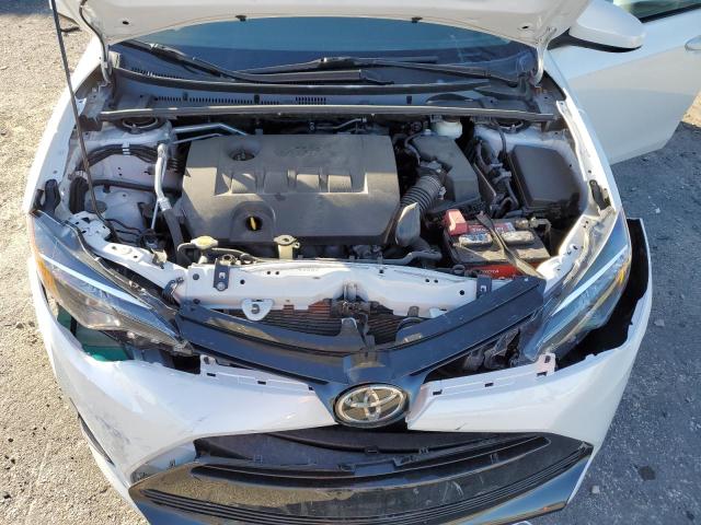 Photo 11 from auction – 2017 TOYOTA COROLLA L with VIN 5YFBURHE5HP620099