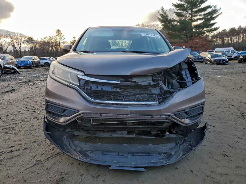 Photo 5 from auction – 2015 HONDA CR-V LX with VIN 3CZRM3H38FG712962