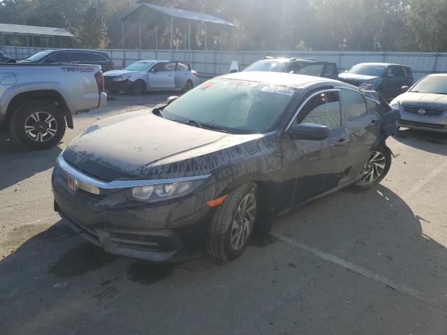 HONDA CIVIC EX 2016 with VIN 19XFC2F74GE098291 - Photo from auction