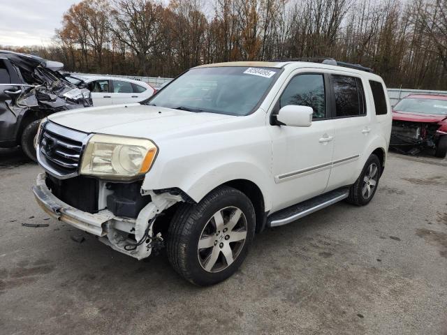 HONDA PILOT TOUR 2015 with VIN 5FNYF4H90FB023252 - Photo from auction