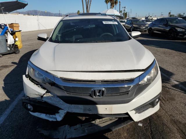 Photo 5 from auction – 2017 HONDA CIVIC EX with VIN 2HGFC1F32HH656038