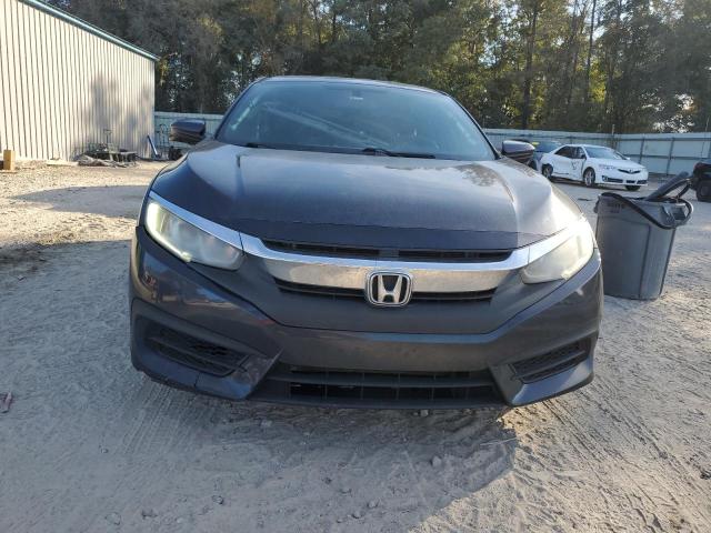 Photo 5 from auction – 2017 HONDA CIVIC EX with VIN 19XFC2F74HE020126