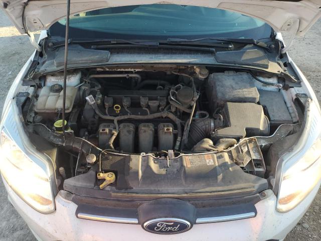 Photo 11 from auction – 2014 FORD FOCUS S with VIN 1FADP3E22EL340819