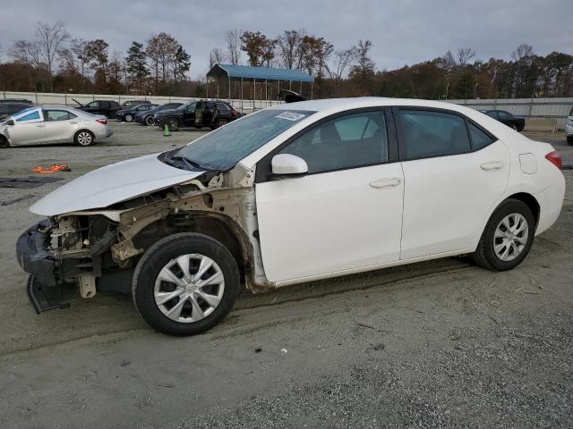TOYOTA COROLLA L 2019 with VIN 5YFBURHE8KP881105 - Photo from auction