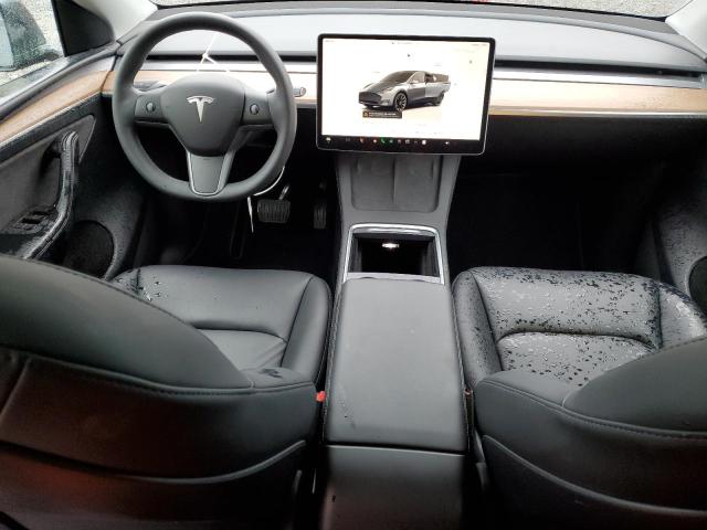 Photo 8 from auction – 2022 TESLA MODEL Y with VIN 7SAYGAEE4NF560429