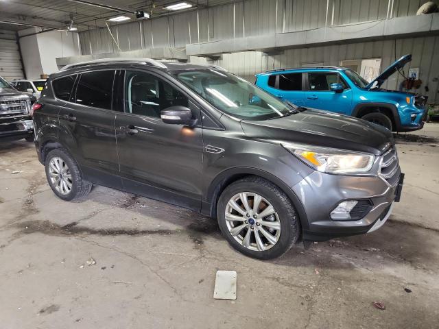 Photo 4 from auction – 2017 FORD ESCAPE TIT with VIN 1FMCU9J92HUD36414