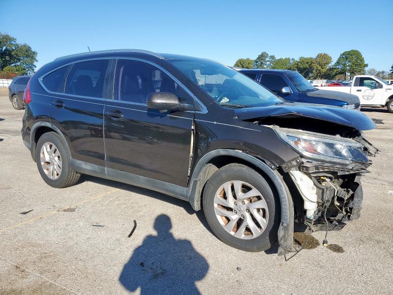 Photo 4 from auction – 2015 HONDA CR-V EXL with VIN 2HKRM3H73FH502883