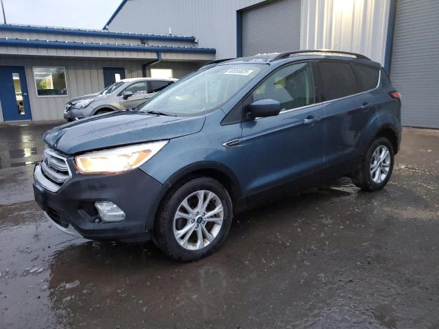 FORD ESCAPE SE 2018 with VIN 1FMCU0GDXJUB63593 - Photo from auction