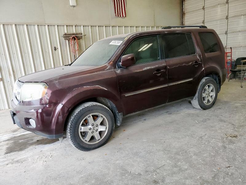 HONDA PILOT TOUR 2010 with VIN 5FNYF3H96AB009455 - Photo from auction