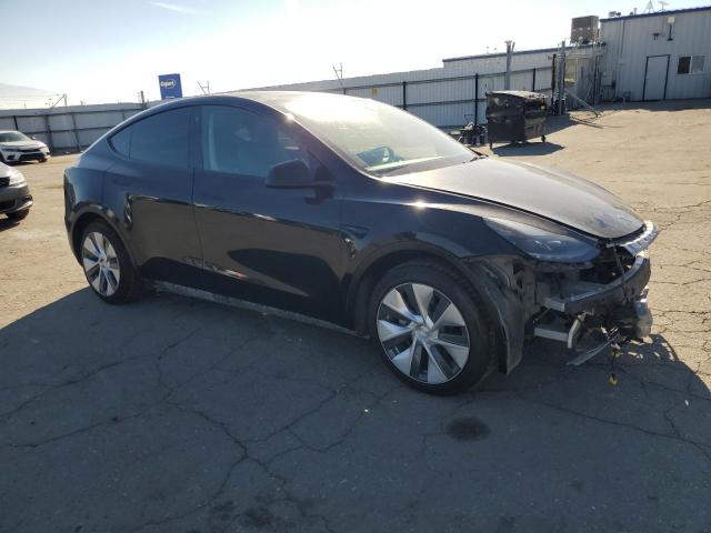 Photo 4 from auction – 2022 TESLA MODEL Y with VIN 7SAYGAEE1NF514878