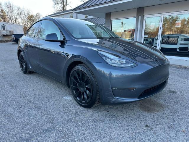 TESLA MODEL Y 2021 with VIN 5YJYGAEE3MF144318 - Photo from auction