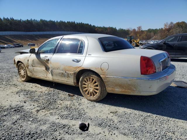 Photo 2 from auction – 2004 LINCOLN TOWN CAR U with VIN 1LNHM83W04Y622705
