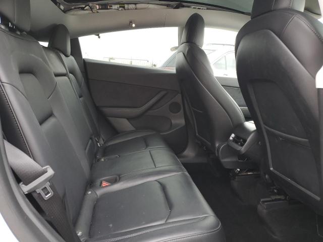 Photo 11 from auction – 2022 TESLA MODEL Y with VIN 7SAYGDEE2NF398429