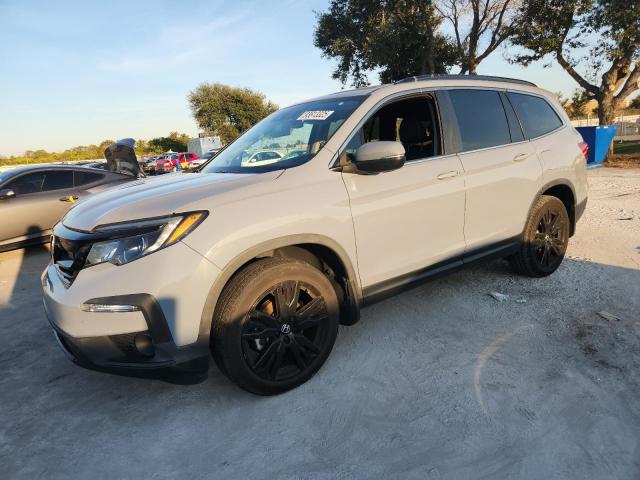 HONDA PILOT SE 2022 with VIN 5FNYF5H21NB027575 - Photo from auction