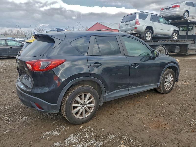 Photo 3 from auction – 2015 MAZDA CX-5 TOURI with VIN JM3KE2CY6F0437931