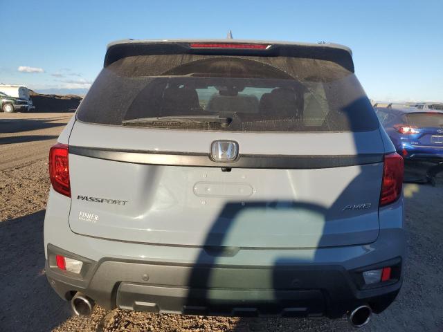 Photo 6 from auction – 2023 HONDA PASSPORT E with VIN 5FNYF8H57PB023271
