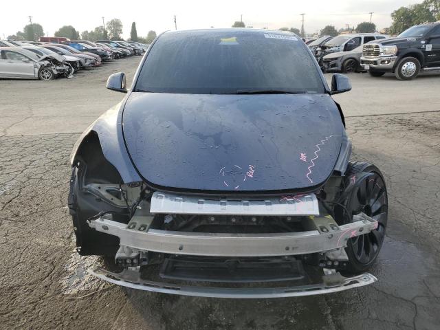 Photo 5 from auction – 2022 TESLA MODEL Y with VIN 7SAYGDEF6NF487557