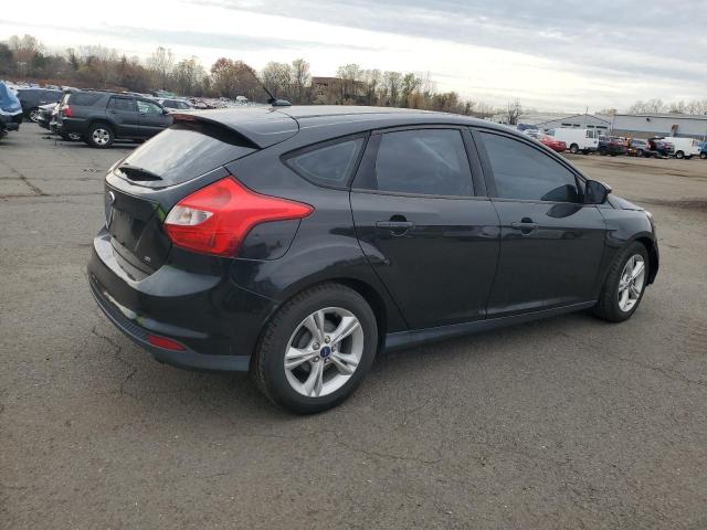 Foto 3 de la subasta – 2014 FORD FOCUS SE con VIN 1FADP3K27EL446509