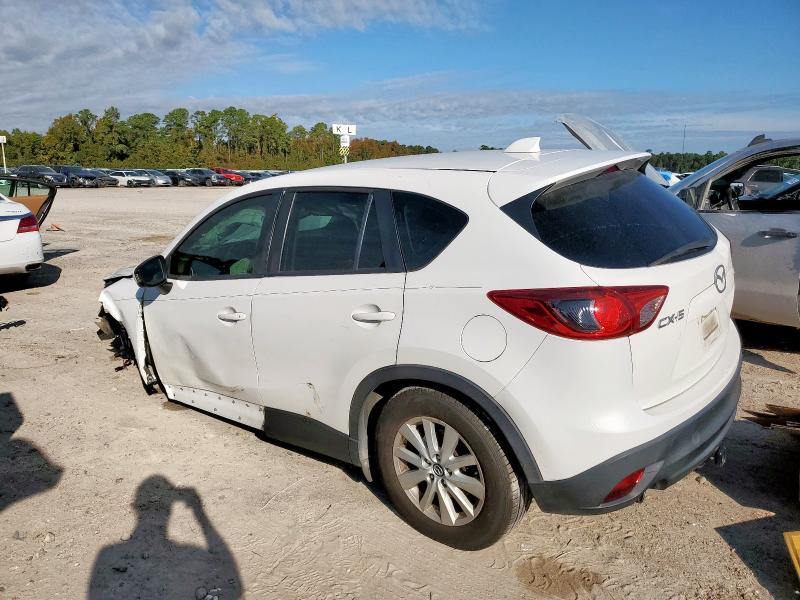MAZDA CX-5 SPORT 2014 with VIN JM3KE2BE6E0335437 - Photo from auction