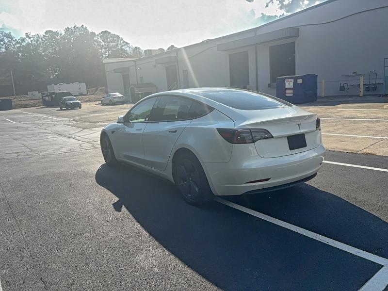 Photo 3 from auction – 2021 TESLA MODEL 3 with VIN 5YJ3E1EA0MF030239