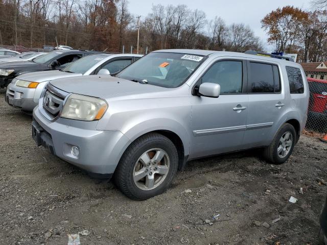 HONDA PILOT EX 2011 with VIN 5FNYF4H46BB094535 - Photo from auction