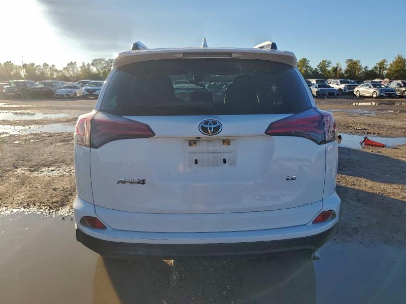 Photo 6 from auction – 2018 TOYOTA RAV4 LE with VIN JTMZFREV2JJ190846