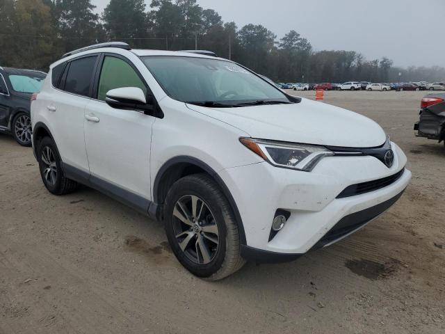 Photo 4 from auction – 2017 TOYOTA RAV4 with VIN JTMWFREV0HJ146387