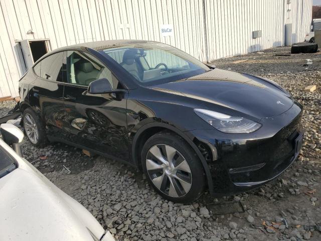 Photo 4 from auction – 2023 TESLA MODEL Y with VIN 7SAYGDEE8PF760010