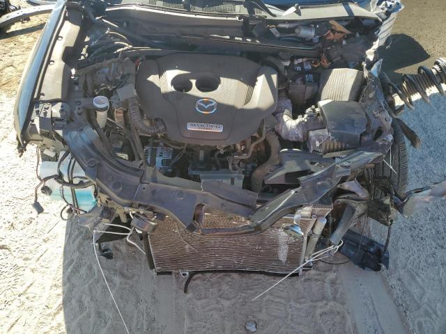 Photo 12 from auction – 2023 MAZDA CX-5 with VIN JM3KFBAY6P0277146