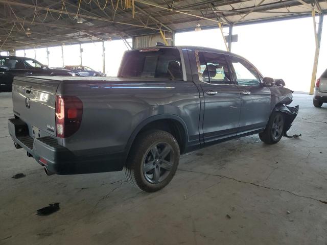 Photo 3 from auction – 2023 HONDA RIDGELINE with VIN 5FPYK3F77PB041229