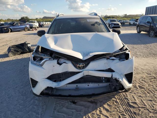 Photo 5 from auction – 2018 TOYOTA RAV4 LE with VIN JTMZFREV7JJ729414