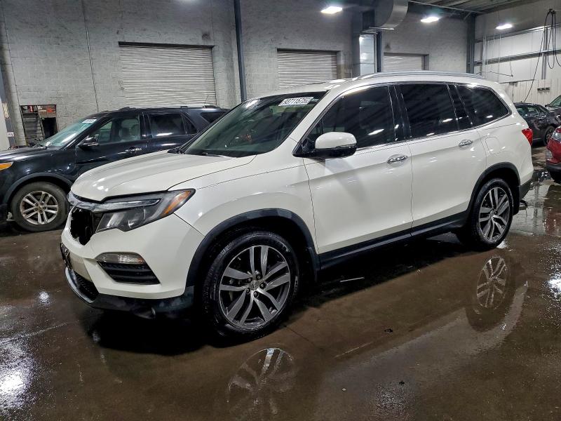 HONDA PILOT TOUR 2016 with VIN 5FNYF5H93GB021115 - Photo from auction