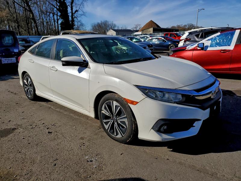 Photo 4 from auction – 2016 HONDA CIVIC EXL with VIN 19XFC1F77GE201553