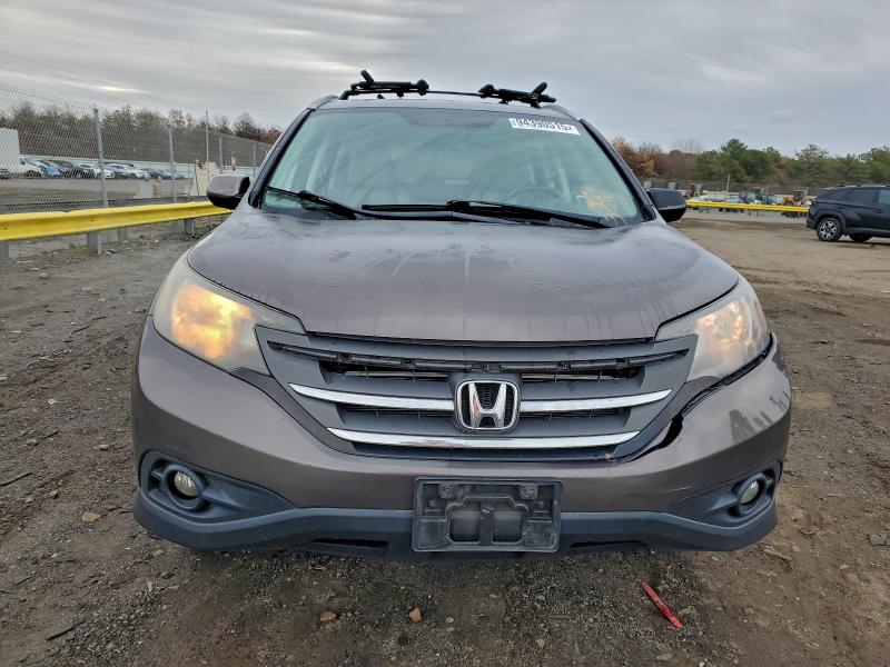 Photo 5 from auction – 2013 HONDA CR-V with VIN 5J6RM4H71DL017179