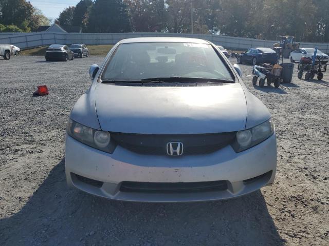 Photo 5 from auction – 2011 HONDA CIVIC LX with VIN 19XFA1F55BE039886