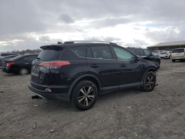 Photo 3 from auction – 2016 TOYOTA RAV4 XLE with VIN 2T3RFREV7GW521933
