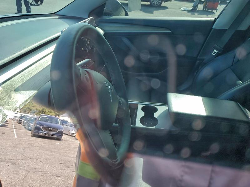 Photo 9 from auction – 2021 TESLA MODEL 3 with VIN 5YJ3E1EC7MF005744