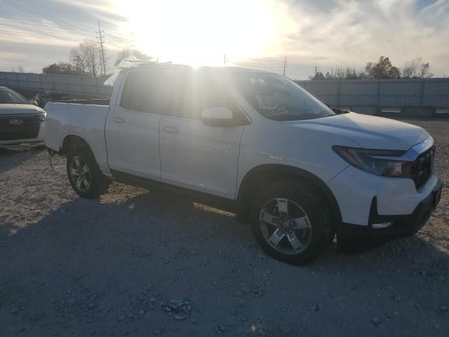 Photo 4 from auction – 2024 HONDA RIDGELINE with VIN 5FPYK3F56RB009762