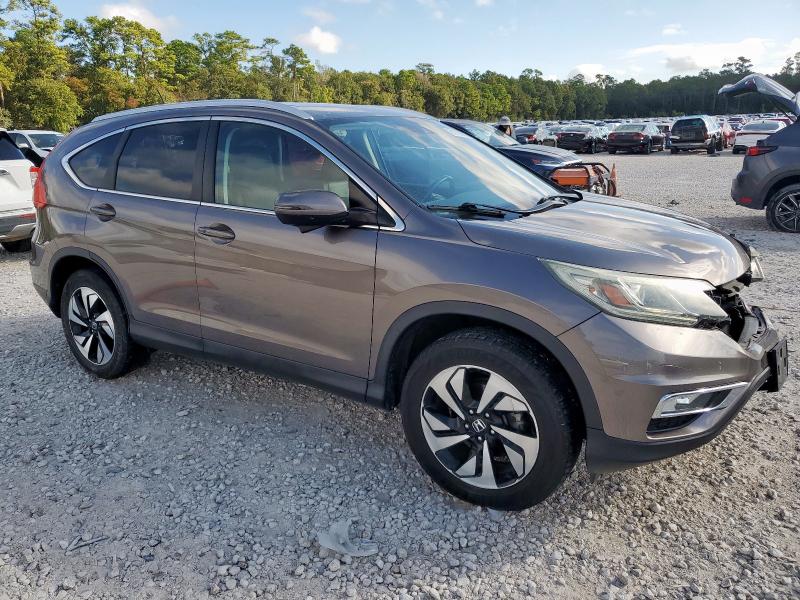 Photo 4 from auction – 2016 HONDA CR-V TOURI with VIN 5J6RM4H98GL006203