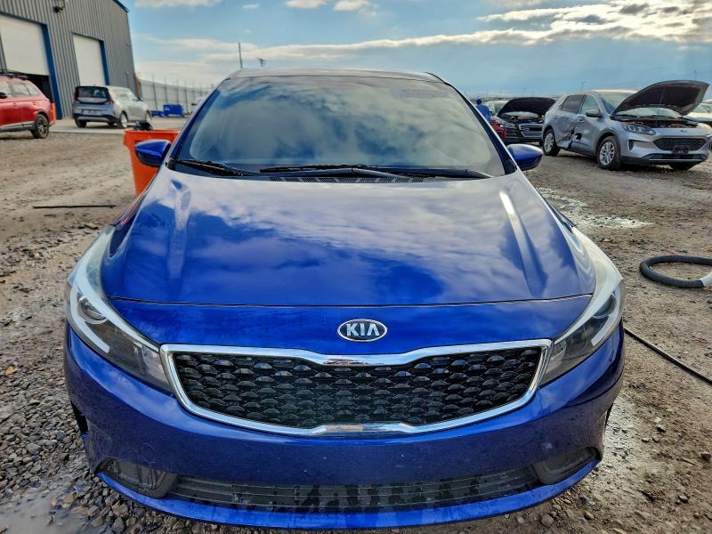 Photo 5 from auction – 2018 KIA FORTE LX with VIN 3KPFL4A72JE195970