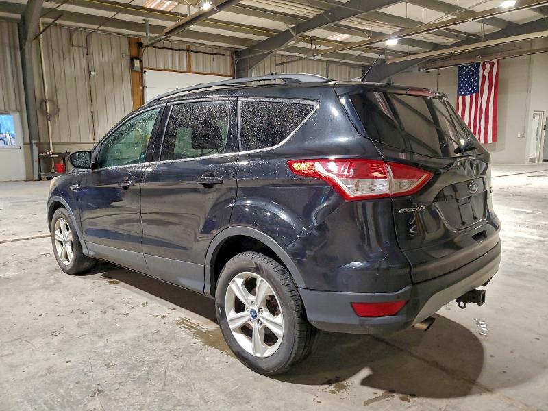Photo 2 from auction – 2014 FORD ESCAPE SE with VIN 1FMCU9G98EUB42084