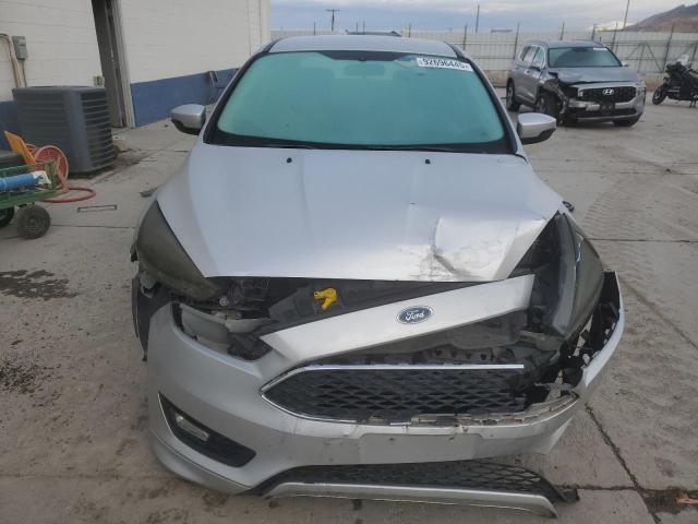 Photo 5 from auction – 2015 FORD FOCUS SE with VIN 1FADP3FE5FL334054