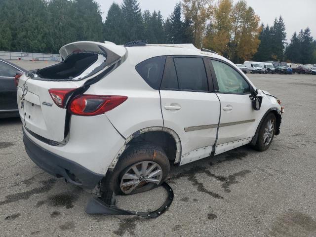 Photo 3 from auction – 2014 MAZDA CX-5 TOURI with VIN JM3KE2CY7E0428895