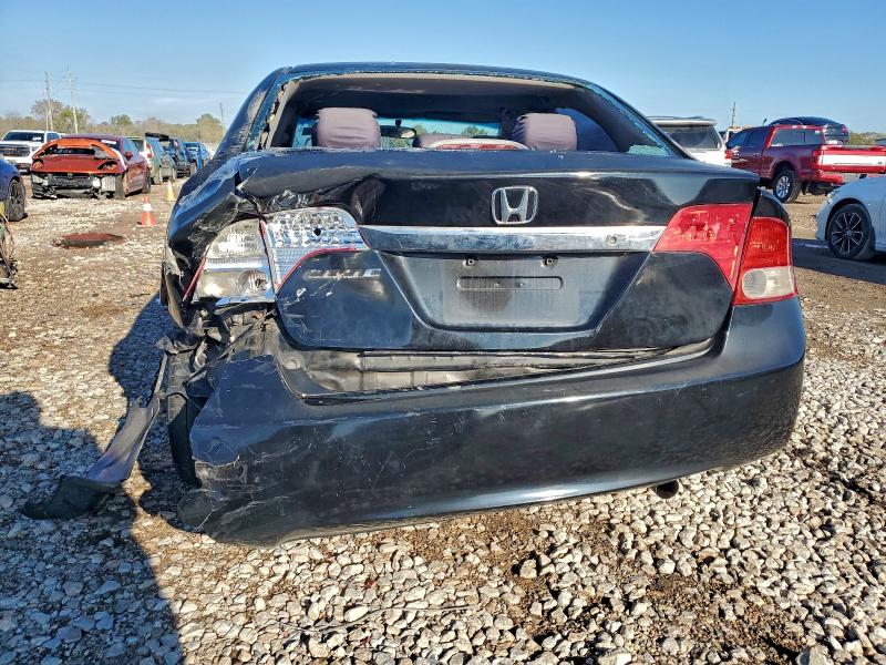Photo 6 from auction – 2011 HONDA CIVIC LX with VIN 19XFA1F50BE005161